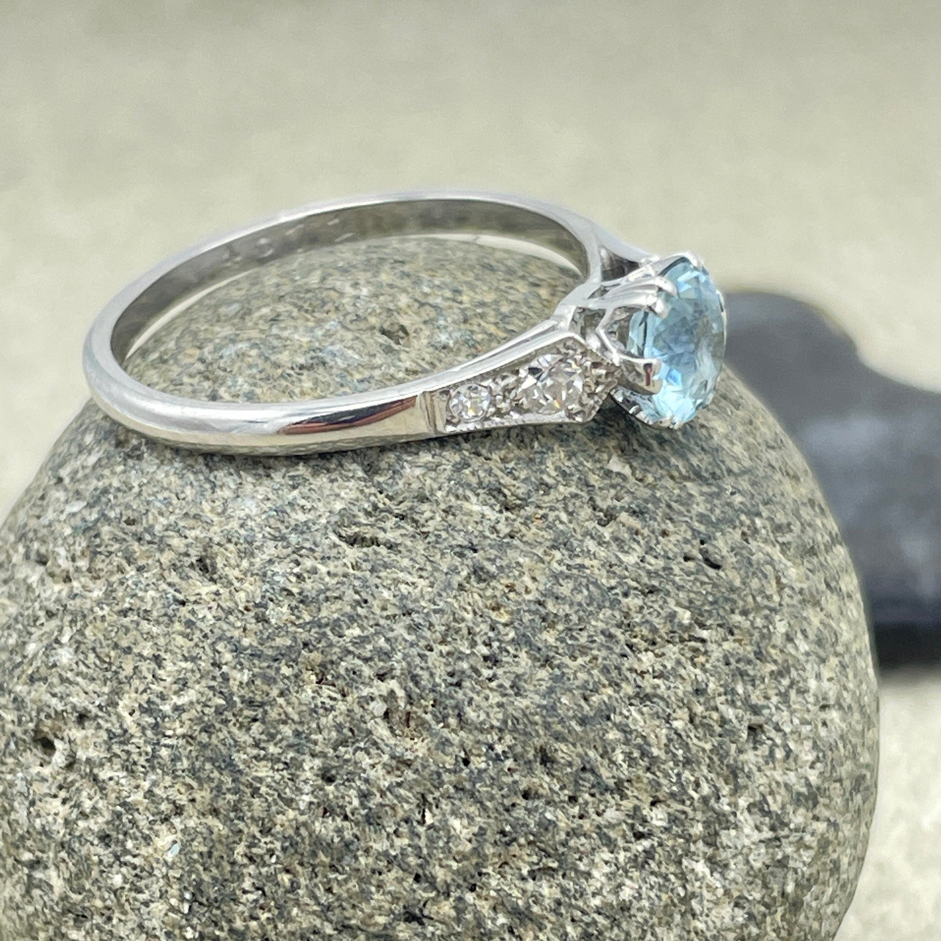 C1920s Art Deco, Platinum, Aquamarine Solitaire ring, with diamond set shoulders