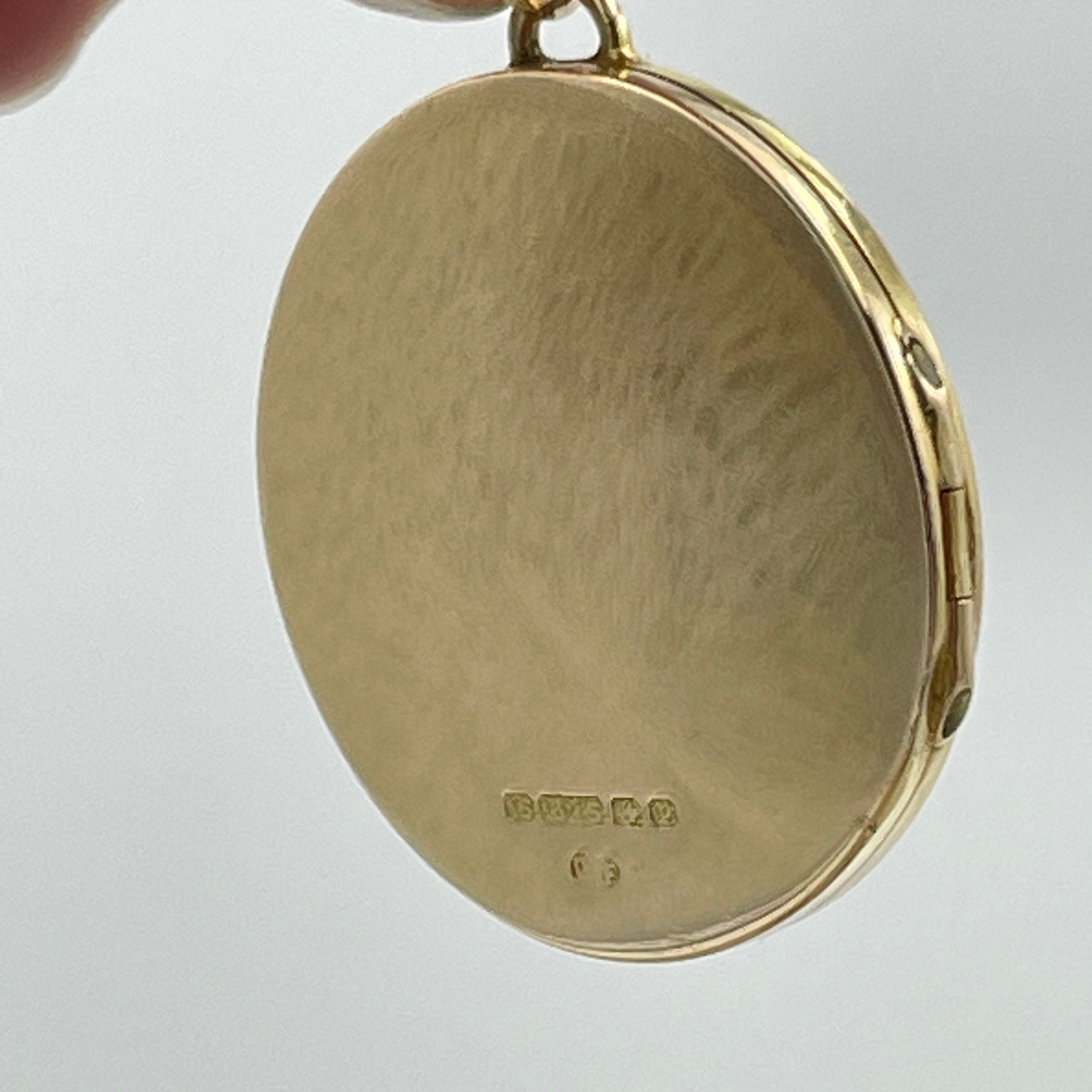 Antique 15ct gold round locket, hallmarked 1914