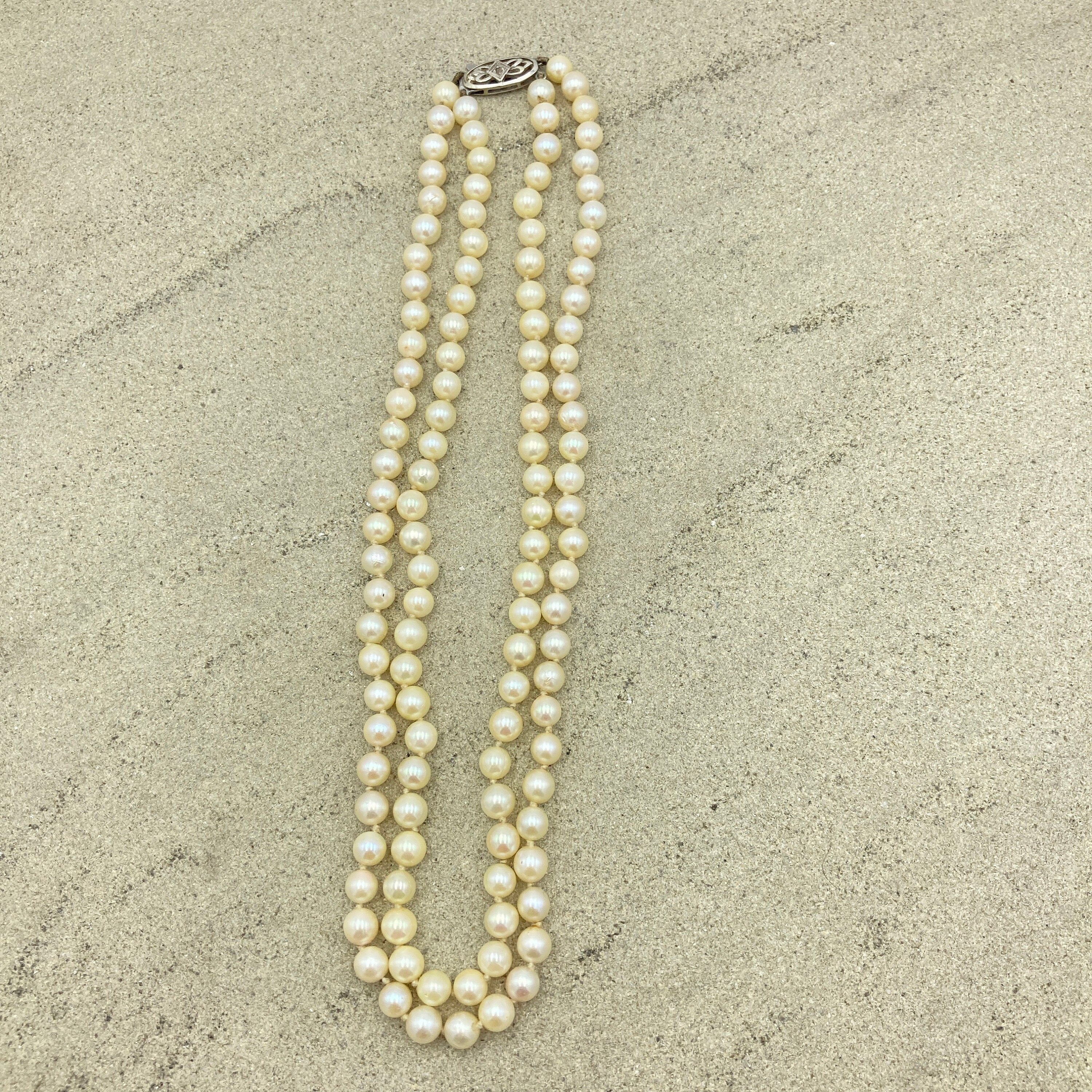 Vintage Double string hand knotted cultured pearls , 9ct white gold & diamond chip clasp, c1920s/30s