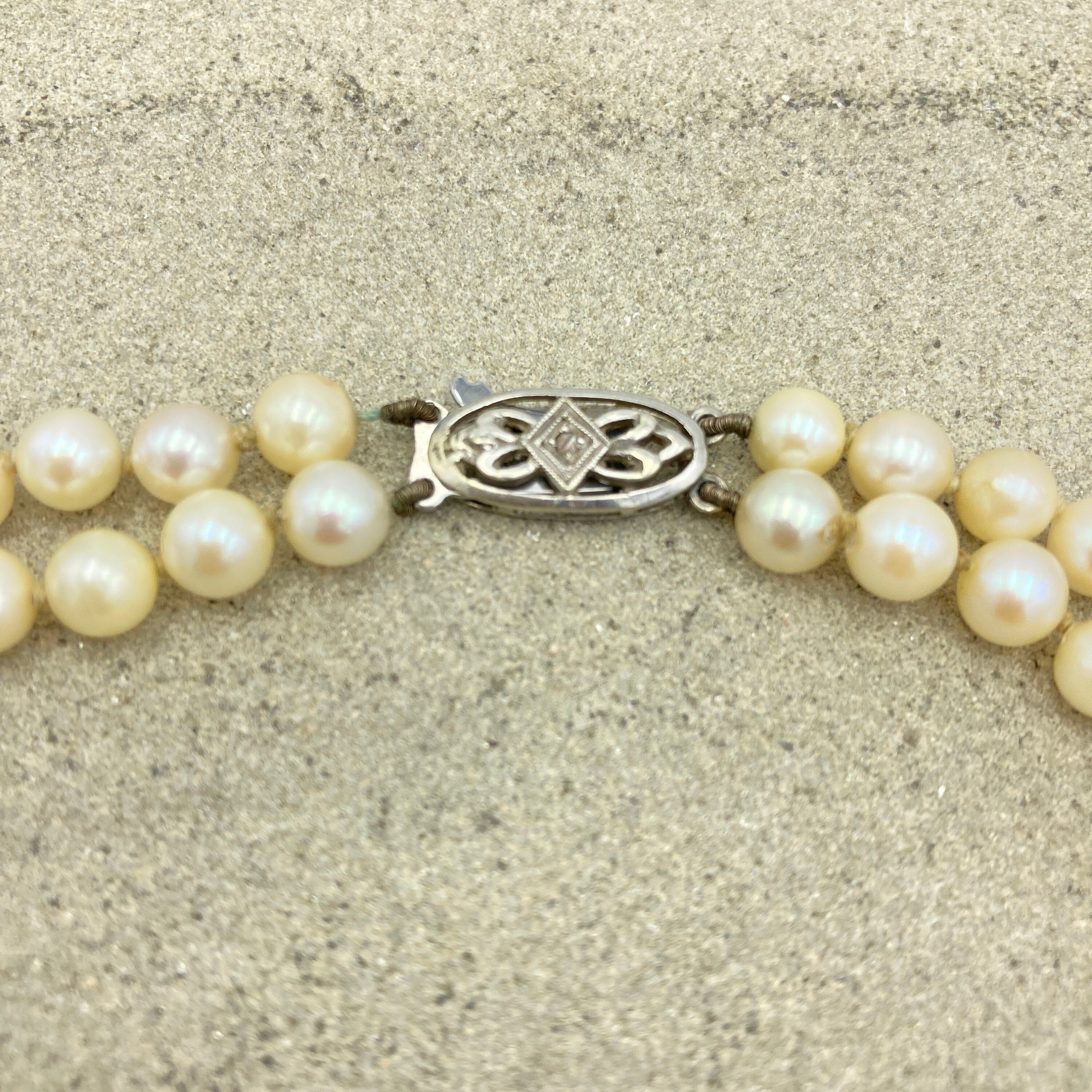 Vintage Double string hand knotted cultured pearls , 9ct white gold & diamond chip clasp, c1920s/30s