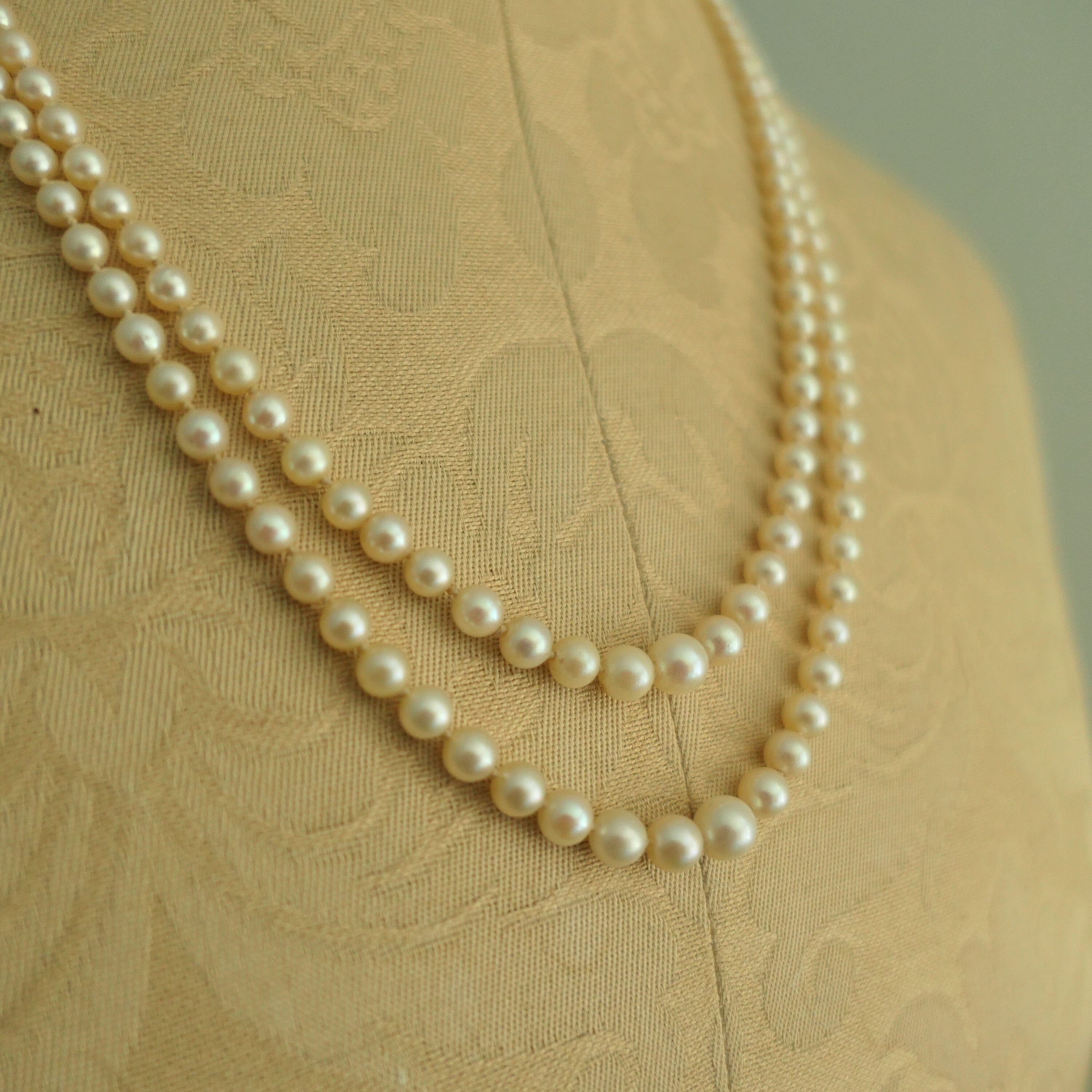 Art deco,  long cultured pearls necklace, double strand with 9ct gold clasp, diamond chip