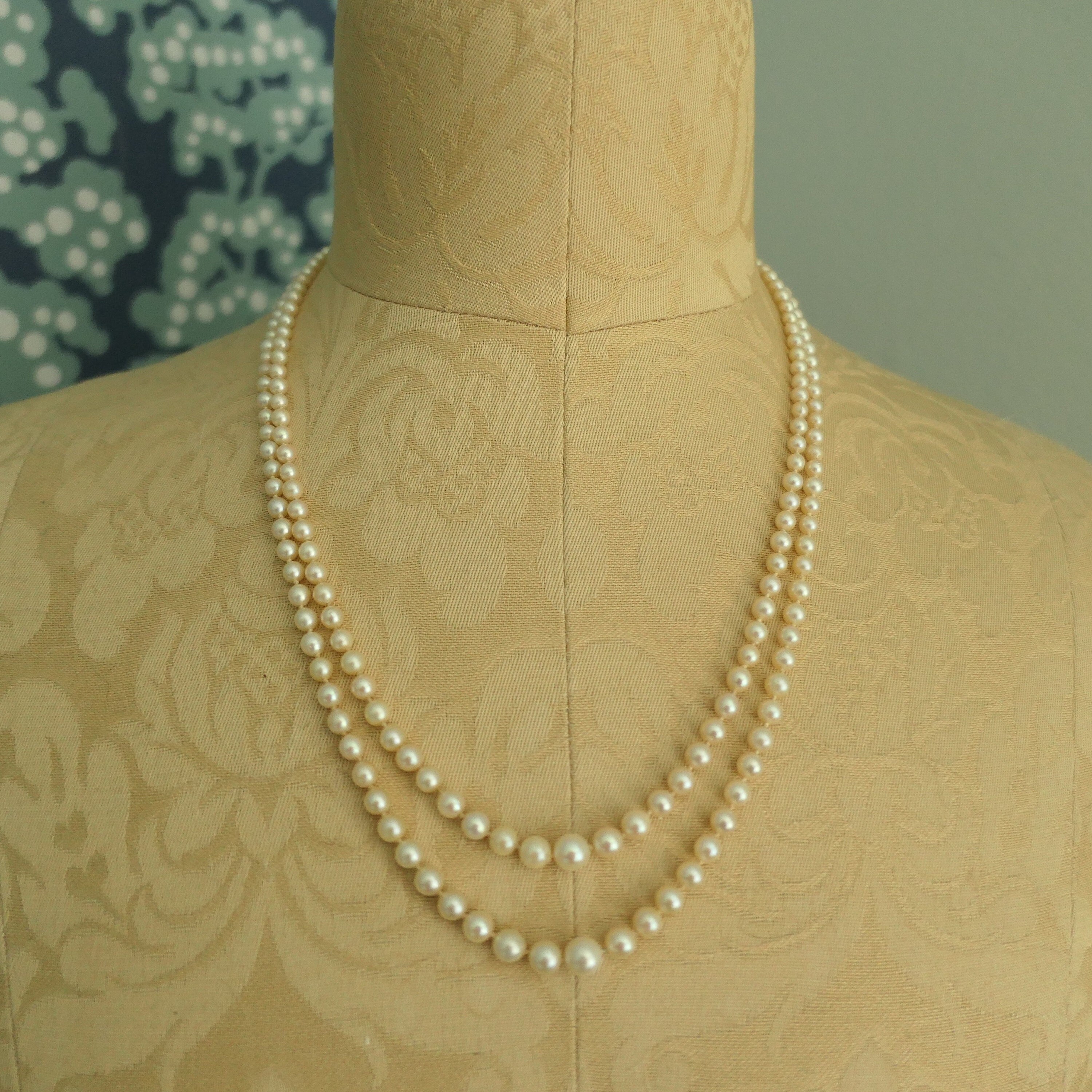 Art deco,  long cultured pearls necklace, double strand with 9ct gold clasp, diamond chip